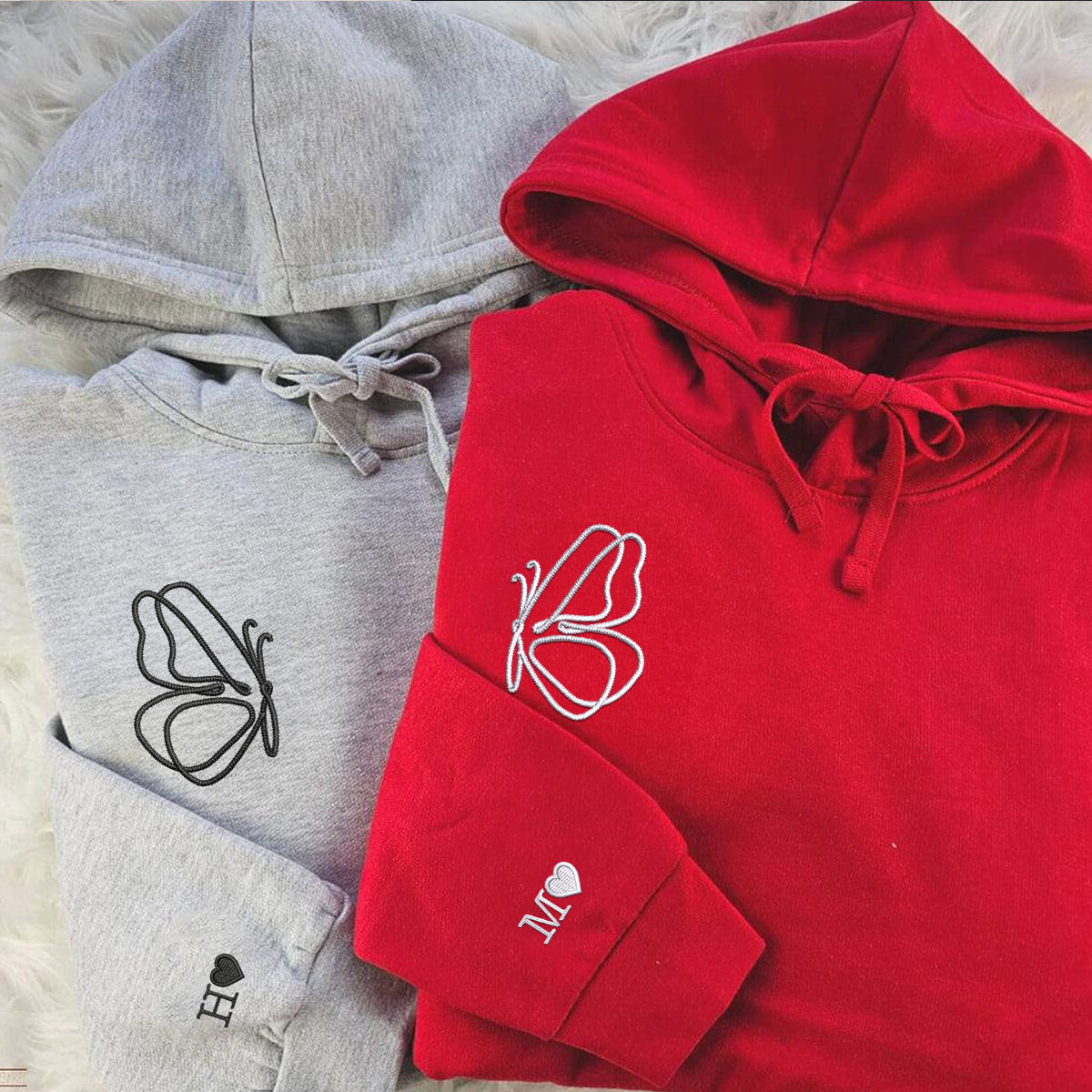 Individuell bestickte Schmetterlings-Kapuzenpullover für Paare