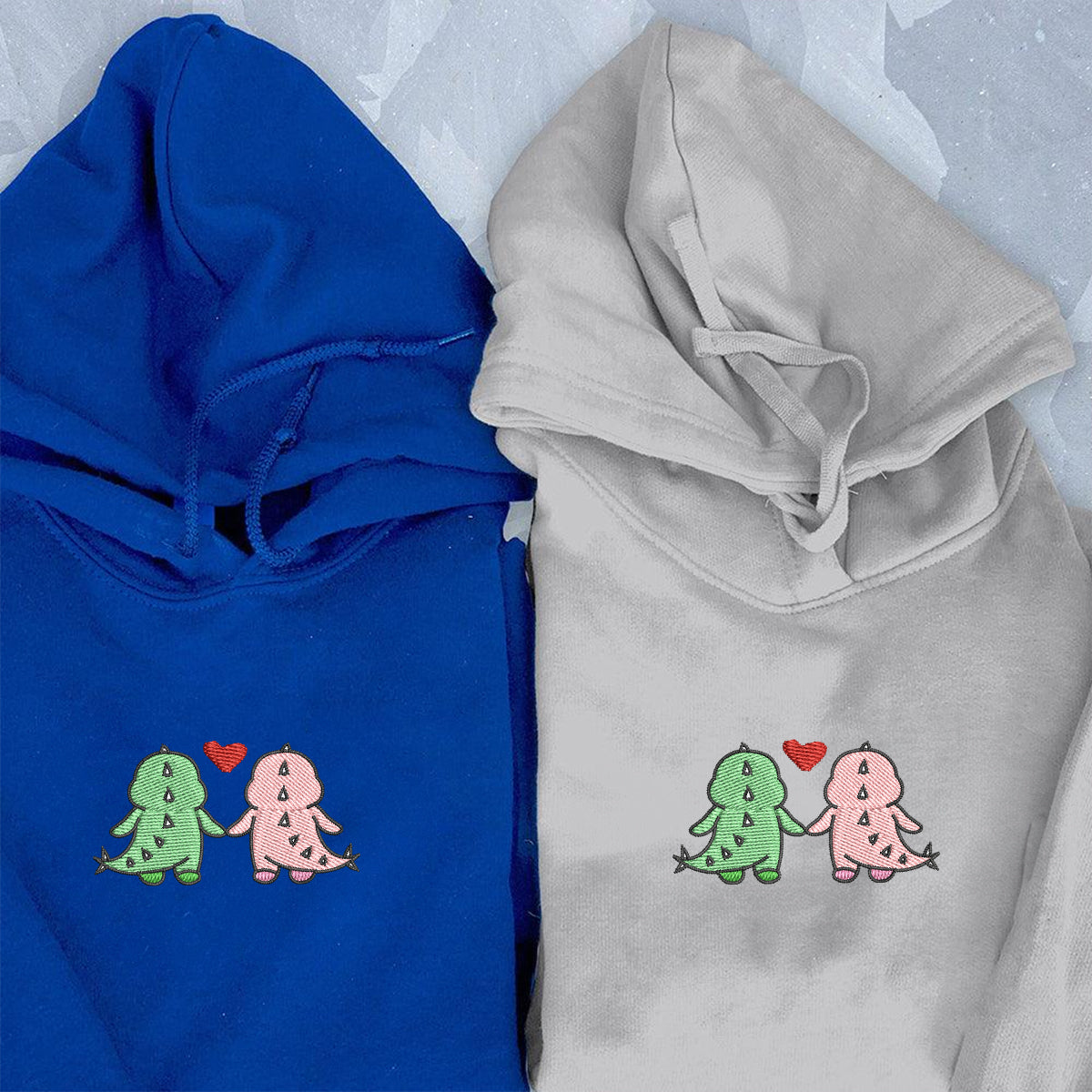 Individuell bestickte Dinosaurier-Paar-Kapuzenpullover für Paare