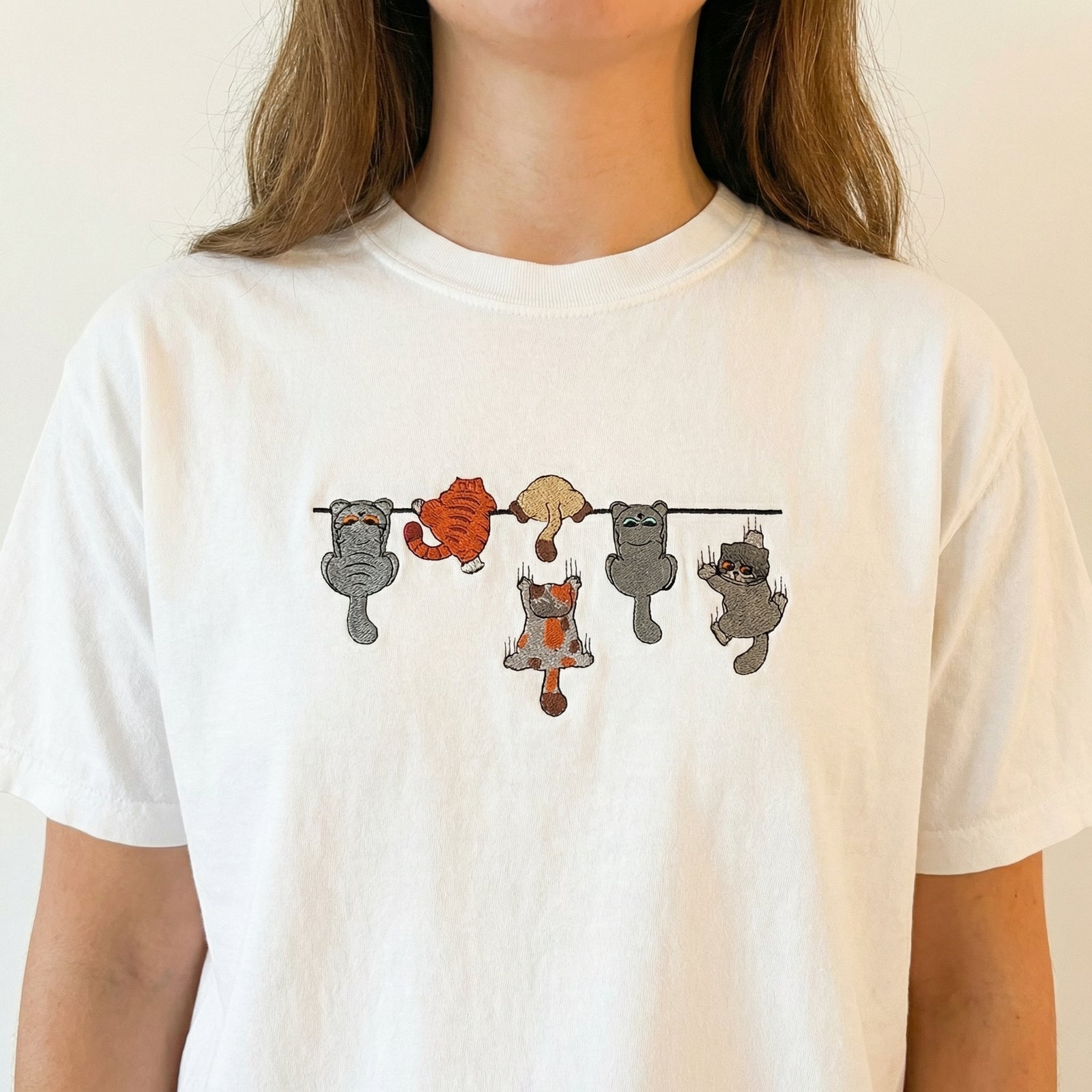 Custom Embroidered Funny Hanging Cats T-Shirt - Playful Pet Lovers Shirt