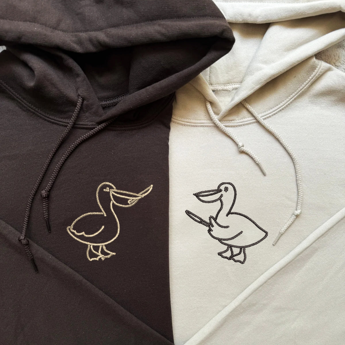 Individuell bestickte Pelikanmesser-Kapuzenpullover für Paare