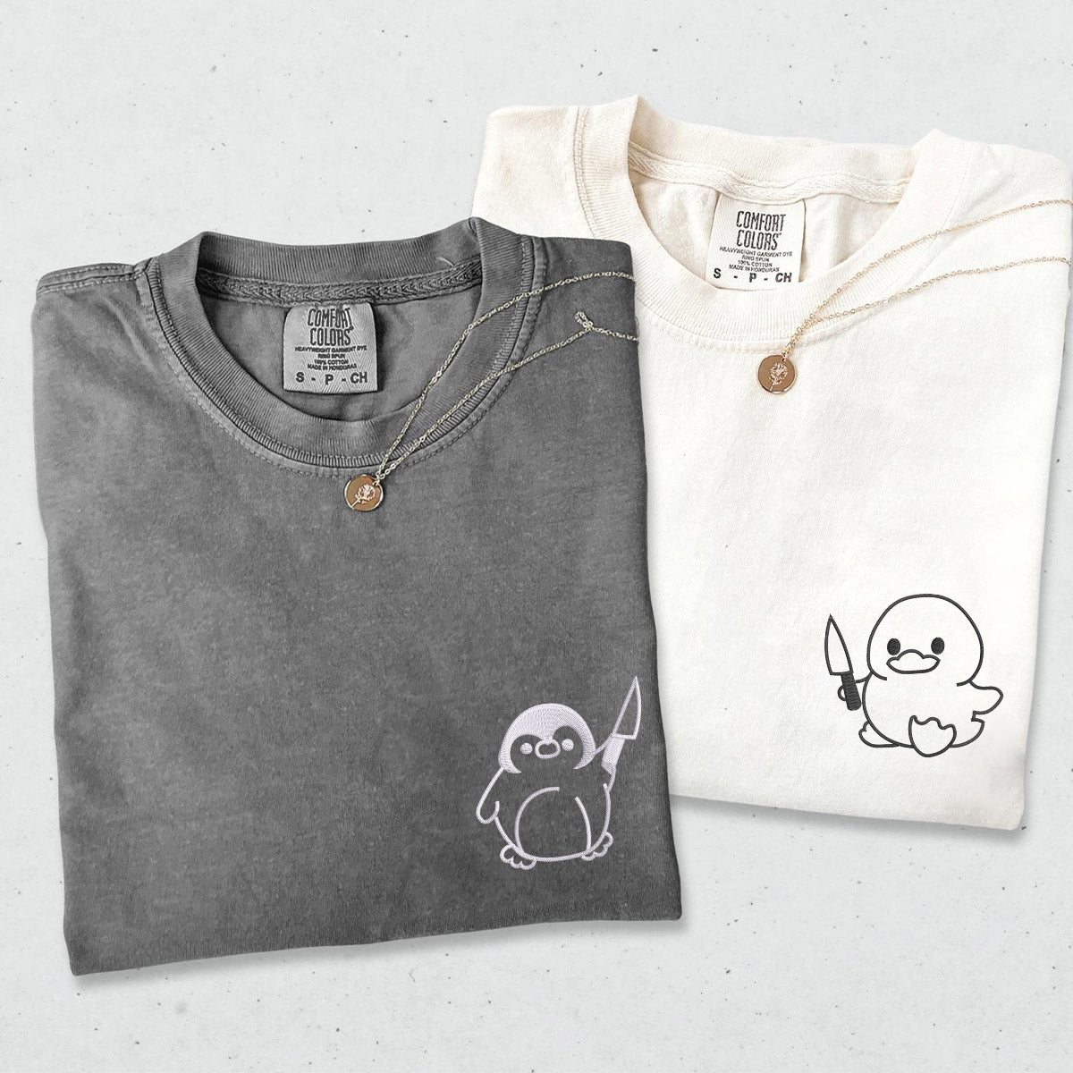 Individuell bestickte Ente und Pinguin mit Messer passende T-Shirts für Paare