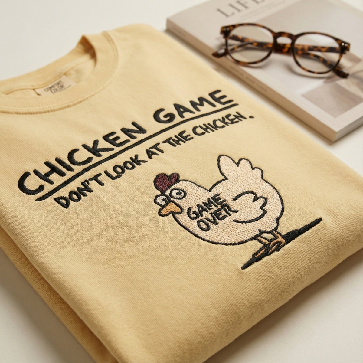 Custom Embroidered Funny Chicken Game T-shirt - Humorous Stitch Artwork
