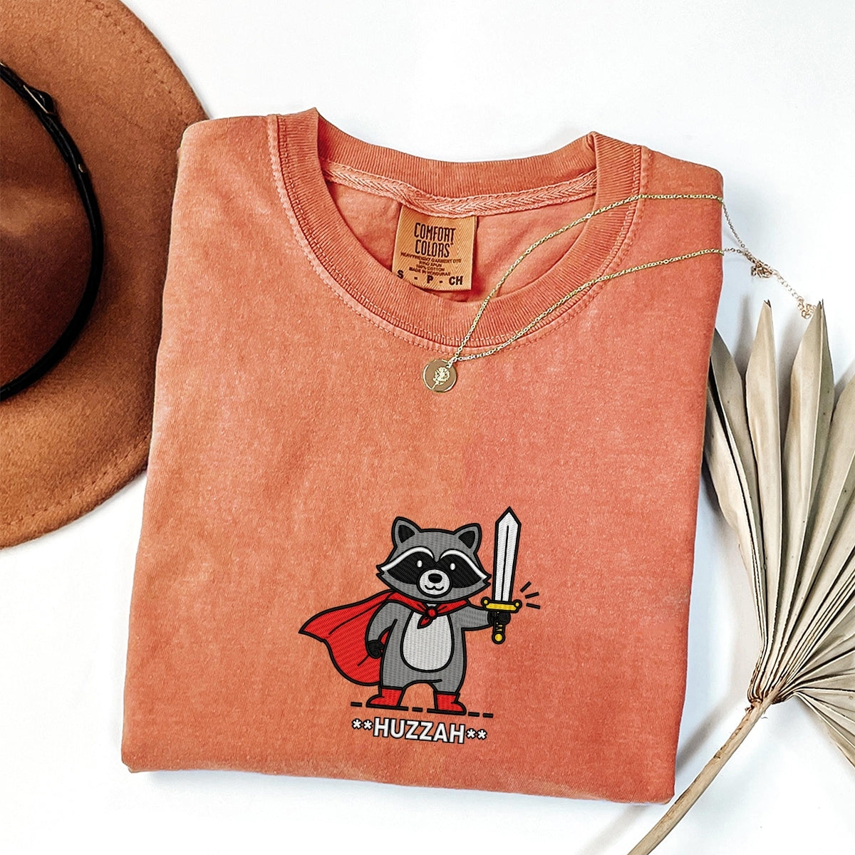 Custom Embroidered Huzzah Raccoon T-Shirt | Funny Medieval Meme Tee – Renaissance Faire & DnD Gamer Gift