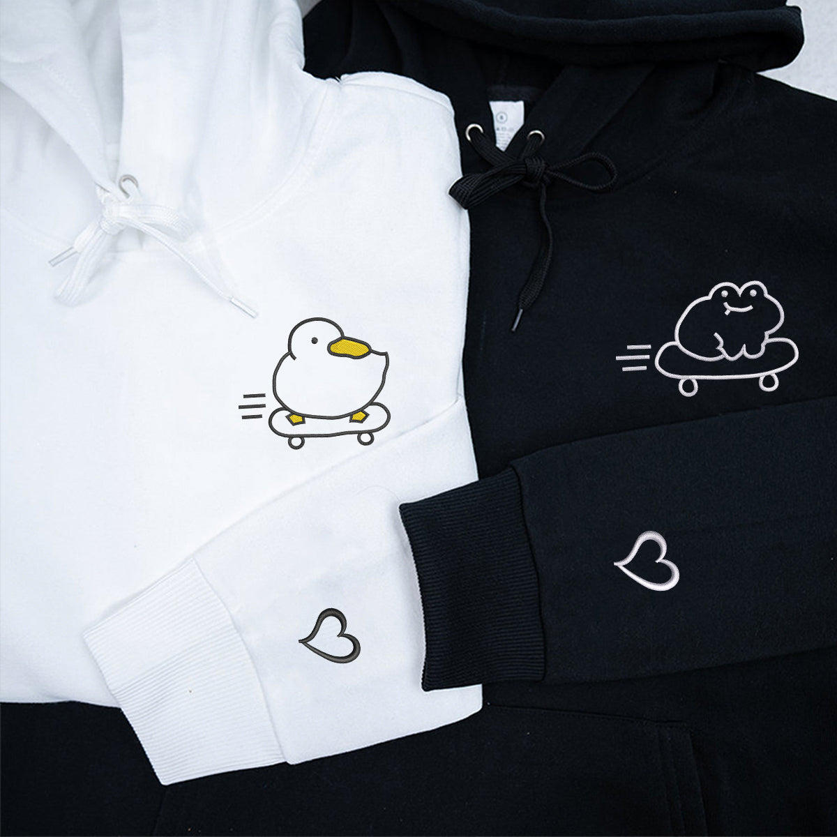 Benutzerdefinierte bestickte Skateboard Froggy und Ducky passende Hoodies für Paare